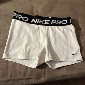 Woman’s White Nike Pro shorts